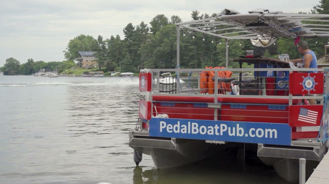 The crew at the dock at Green's Park with the boat ready
